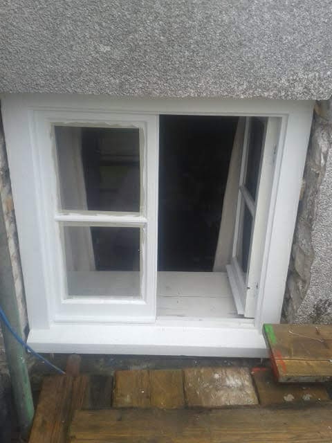 Pembrokeshire listed building replacement wooden window.
